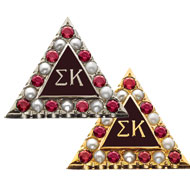 Alternating Crown Pearl With *Garnet Points Badge product image